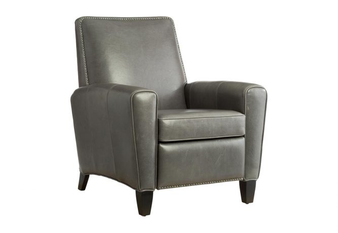 leather reclining chair featuring nail head trim