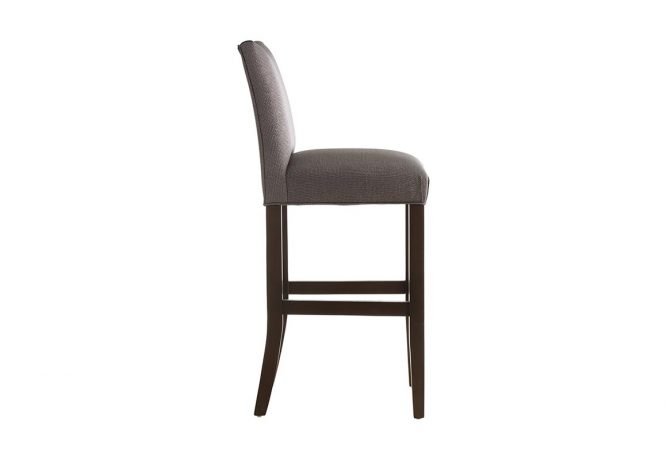 Side view of a 10101 traditional bar stool that has a pleated seat and curved back