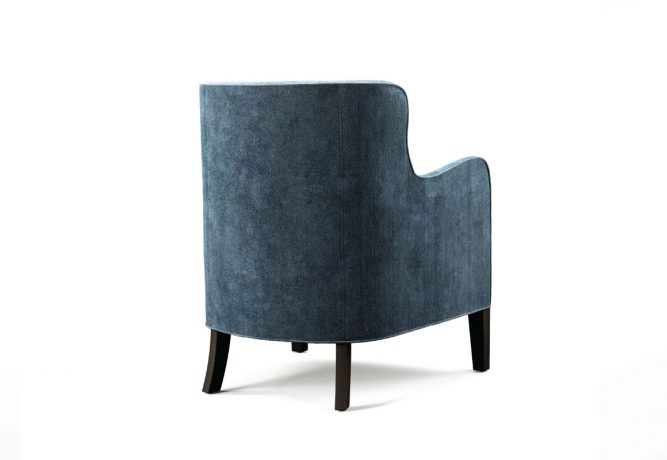 harper stationary chair with a curved back