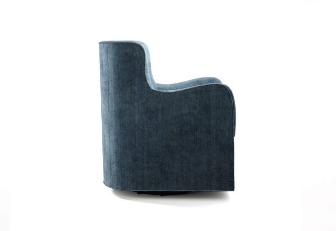 A side view of a sleek, dark navy blue velvet swivel glider chair